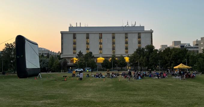 building with the sunset in the background