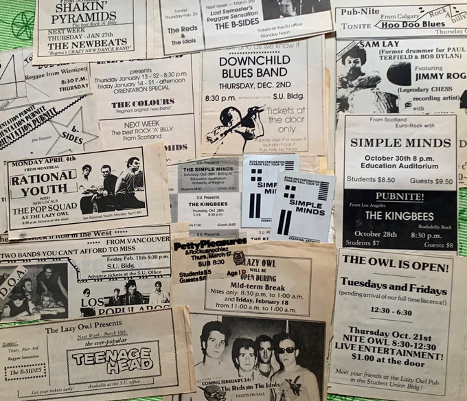 Vintage posters and tickets to past shows at the Lazy Owl