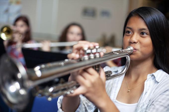 Students playing trumpet