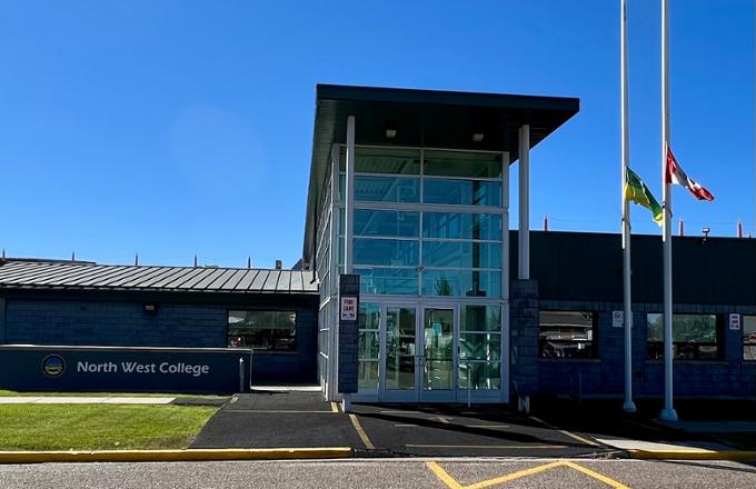 A wide shot of the front of a college building