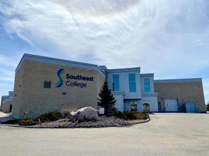 A wide shot of the front of a college building