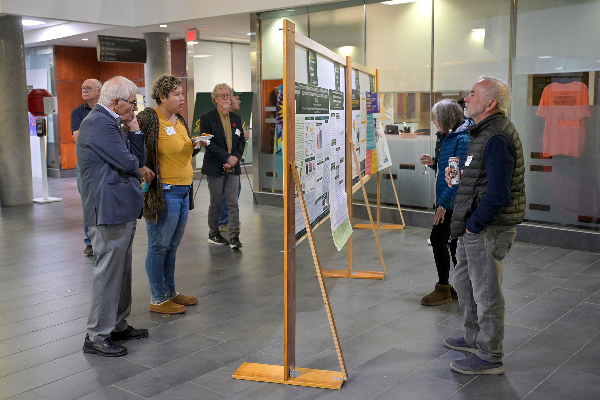 People looking at posters