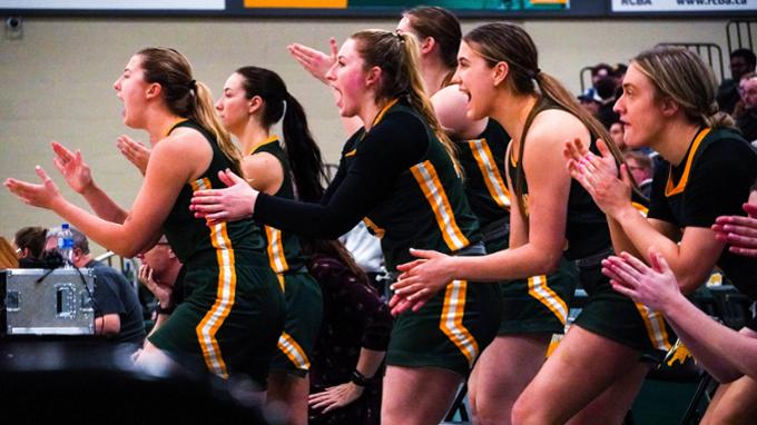 Basketball players cheering