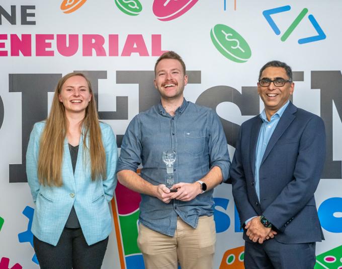 A group of three pose for a picture. From left to right, Yelyzaveta Bielaia, previous Entrepreneurial Collision Space Coordinator, David Crossman, and Saqib Khan.