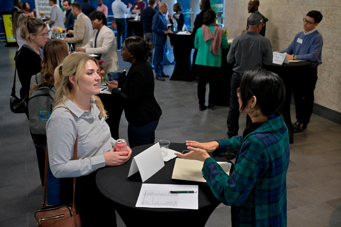 Student speaking to employer