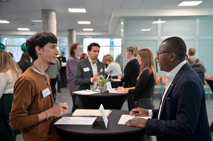 Student speaking to employer