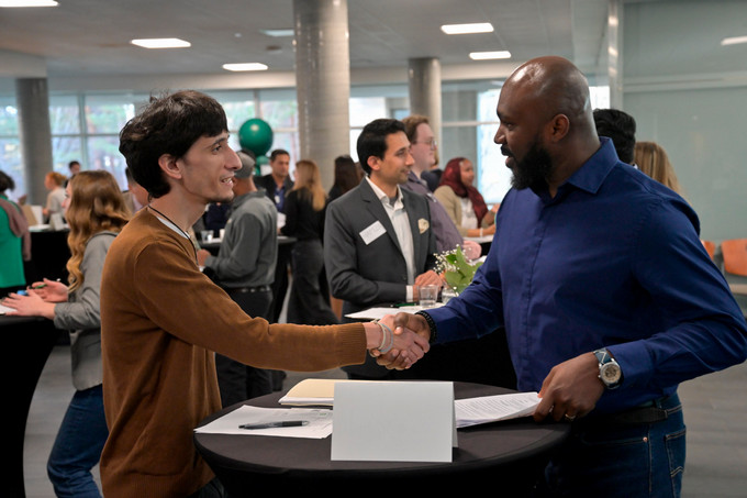 Students meeting employers at Reverse Career Fair