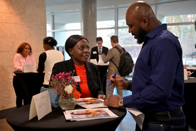 Student speaking to employer