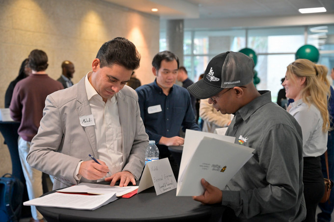 Student speaking to employer