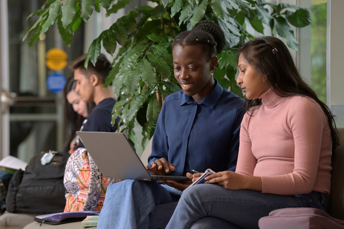 students on laptop