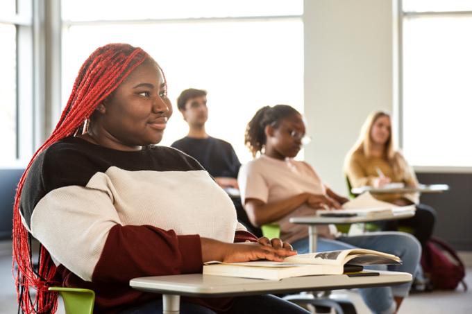 A student sitting in a classroom