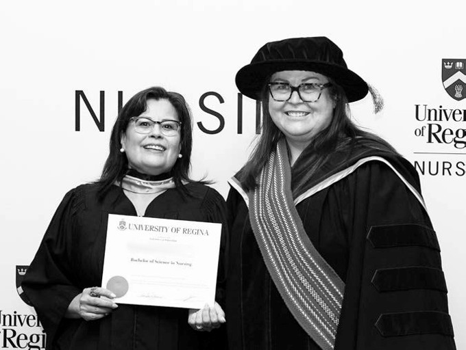 nursing graduate with the Dean