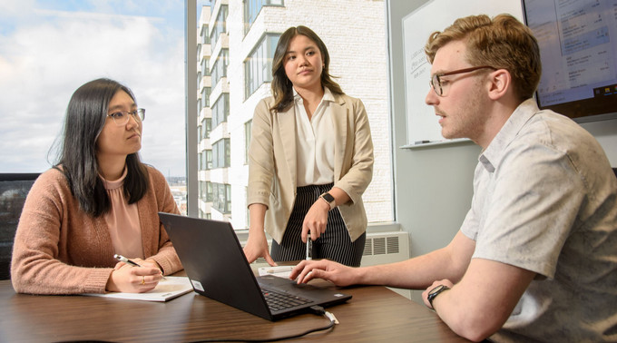 Three students having a discussion