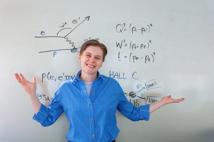 Alicia in front of whiteboard