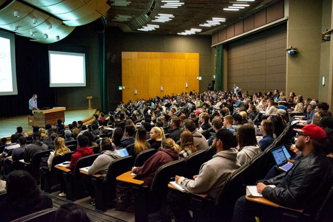 The Education Auditorium full of students. 