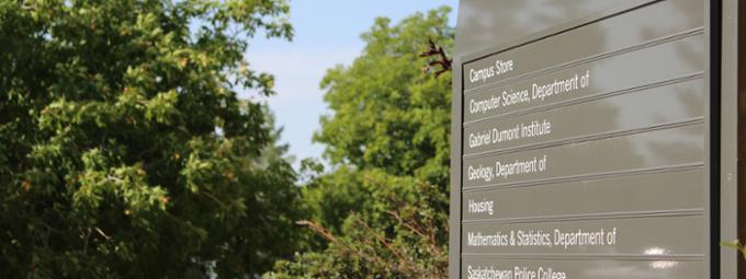 Sign outside the College West building