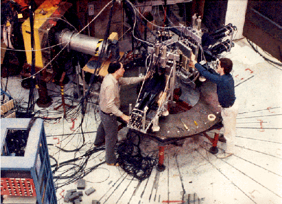 Dr. Lolos (left) with graduate student (and eventual faculty member) Z. Papandreou (right) setting up the apparatus for a 1986 pion absorption experiment at the M11 pion channel at TRIUMF.