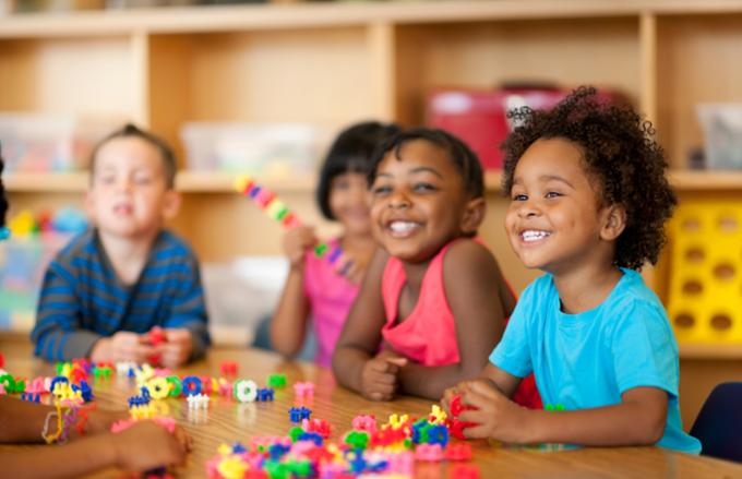 Four children smiling