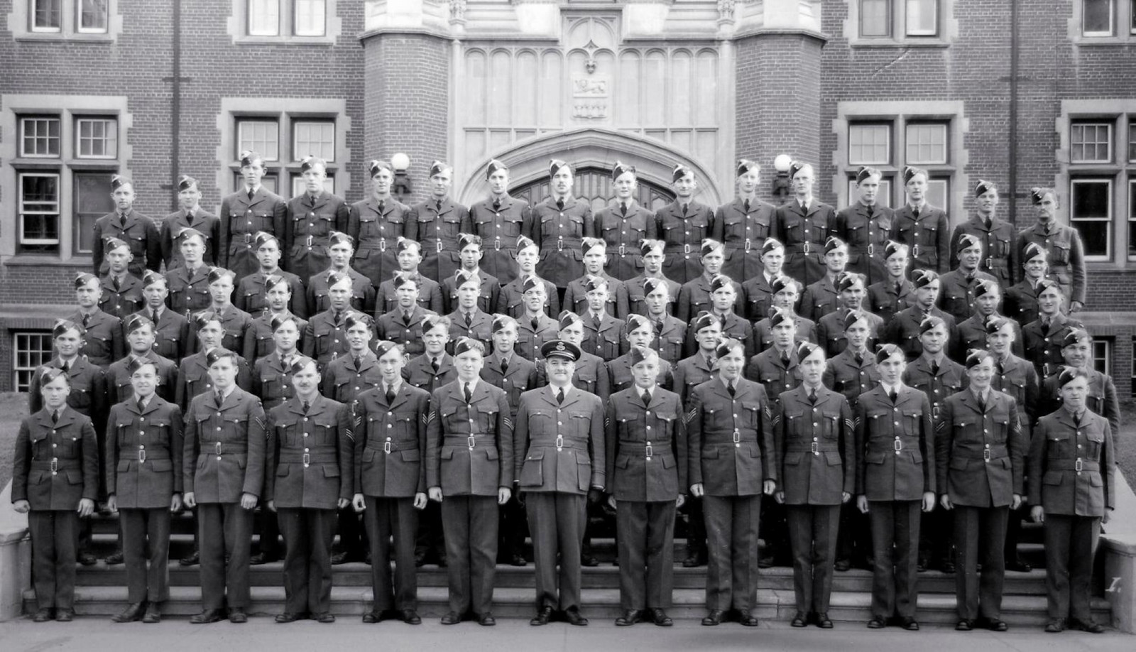 Black and white photo of men in uniform