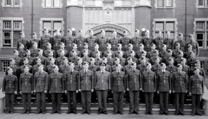 Black and white photo of men in uniform