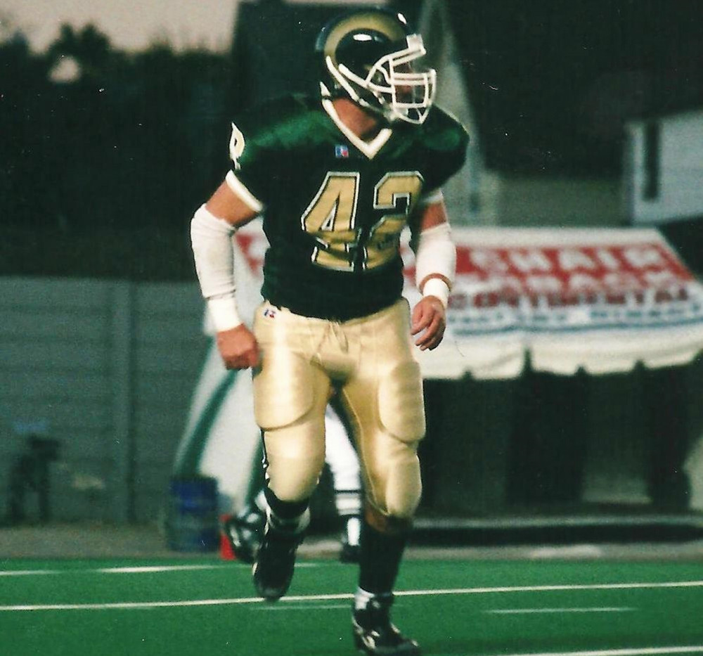 A football player running on a field