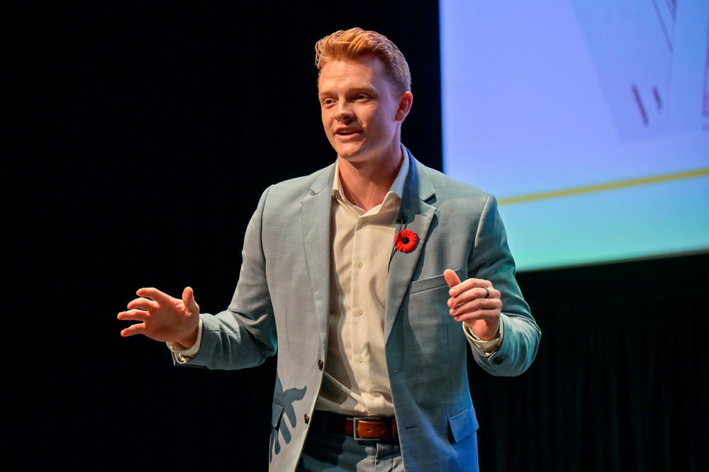 a speaker at a podium