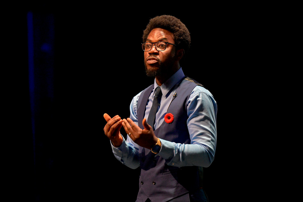 a speaker at a podium