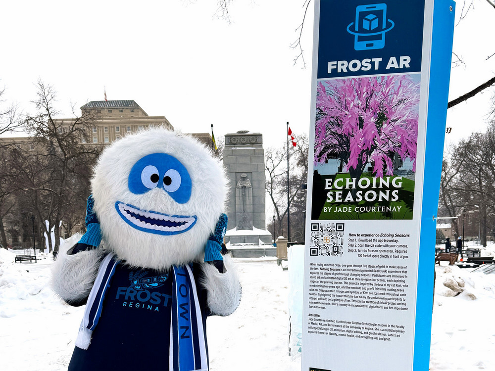 a mascot stands near a sign