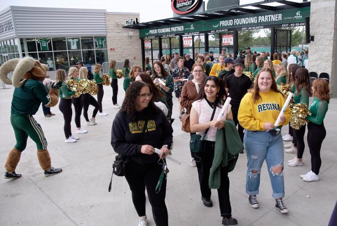 U of R students entering Mosaic Stadium in Regina.