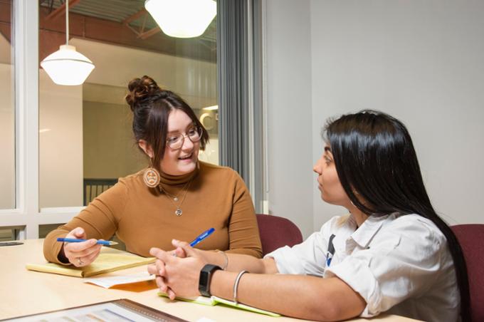 Student with an advisor.