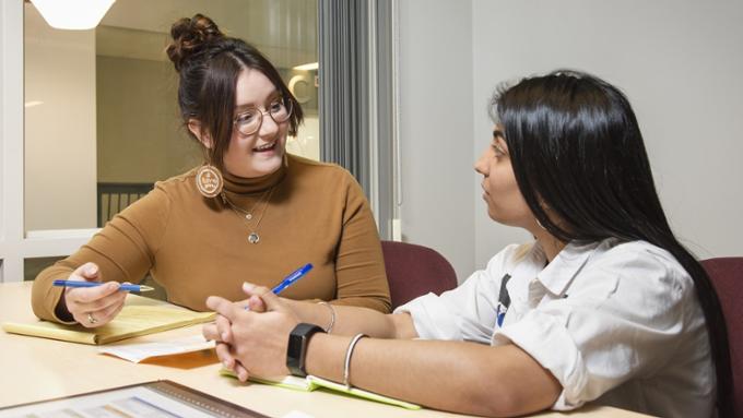 Advisor talking to a student