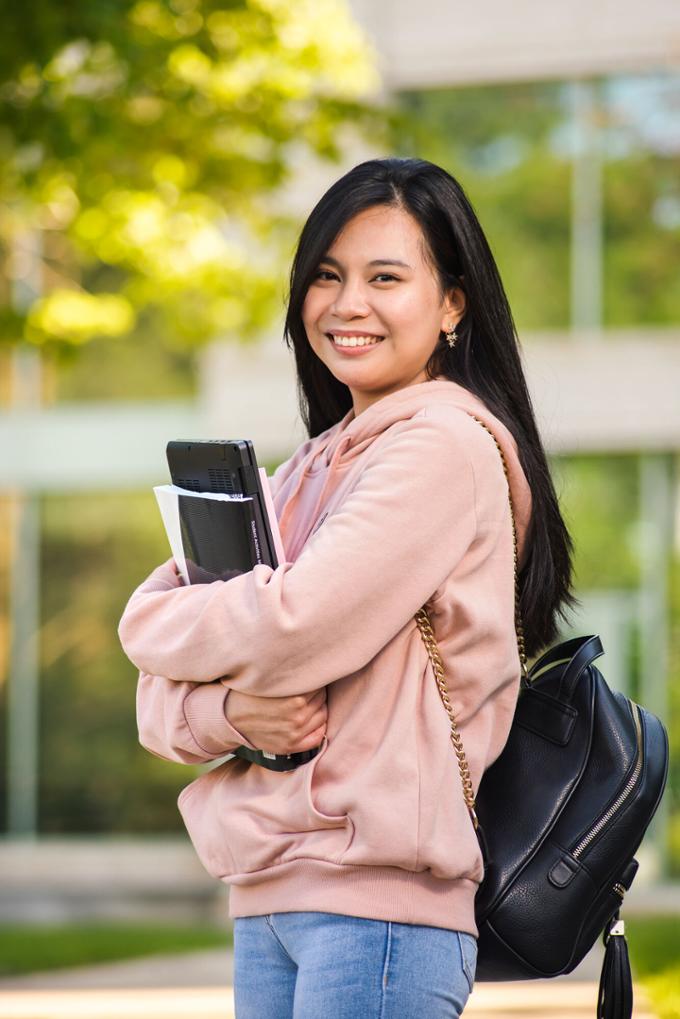 Student holding books