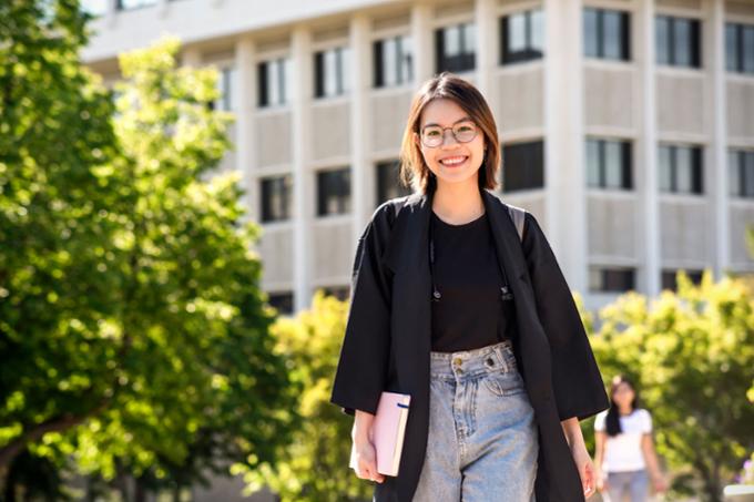 Student walking with books