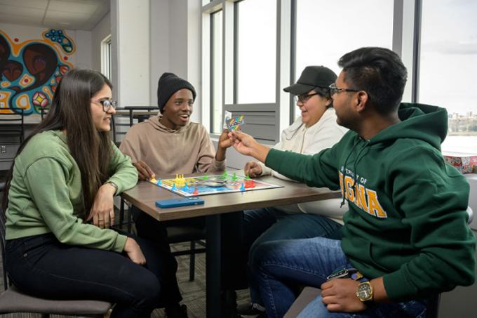 Students playing a board game