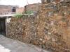 Brick wall in alleyway